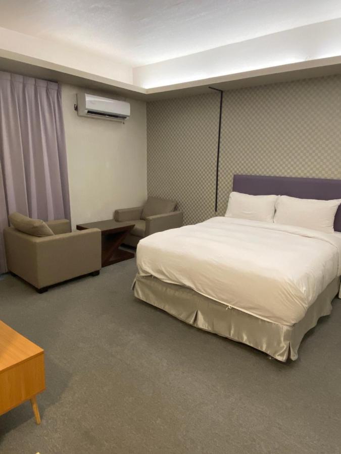 Aiyue Hotel Huwei Exteriör bild